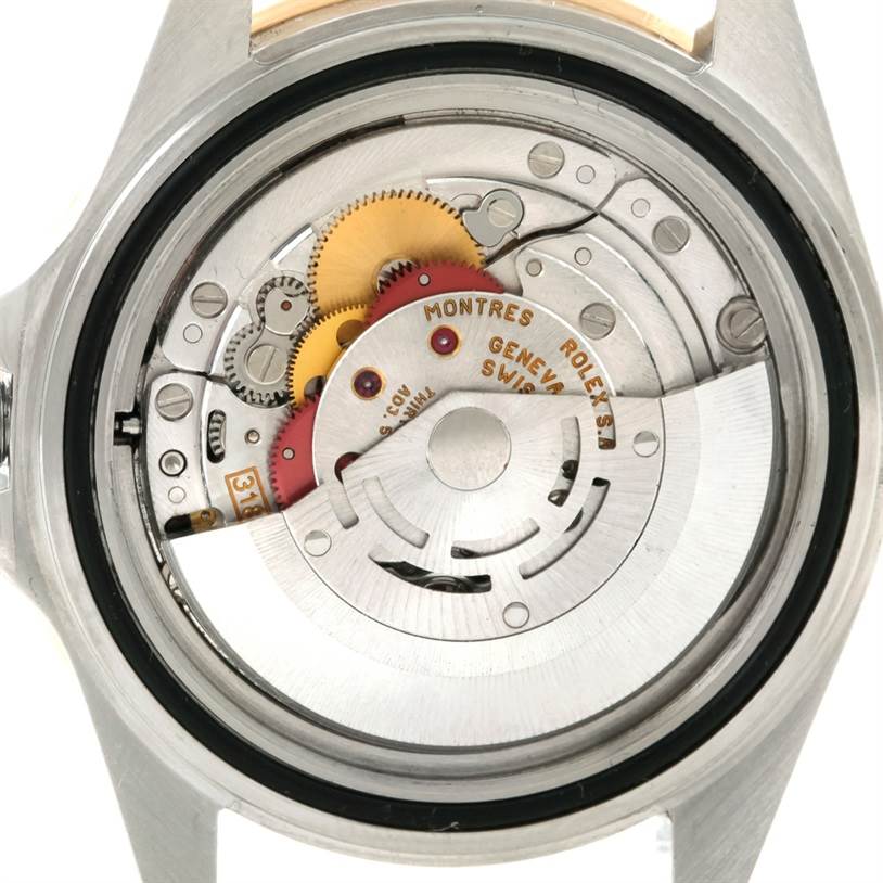 This image shows the movement and internal mechanism of the Rolex GMT-Master 16713 Men's Stainless Steel Black Dial 16713 Men's Stainless Steel Black Dial watch from a rear angle.
