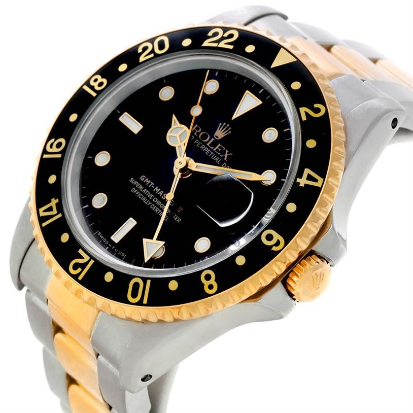 The image shows a side angle of the Rolex GMT-Master 16713 Men's Stainless Steel Black Dial 16713 Men's Stainless Steel Black Dial watch, highlighting its dial, bezel, crown, and two-tone bracelet.