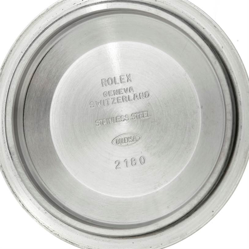 This image shows the inside case back of a Rolex GMT-Master 16710 Men's Stainless Steel Black Dial 16710 Men's Stainless Steel Black Dial watch, featuring engravings of the brand, origin, and material details.