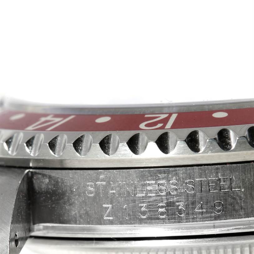 This image shows a close-up angle of the bezel and case, highlighting the model and material engraving of the Rolex GMT-Master 16710 Men
s Stainless Steel Black Dial 16710 Men
s Stainless Steel Black Dial watch.