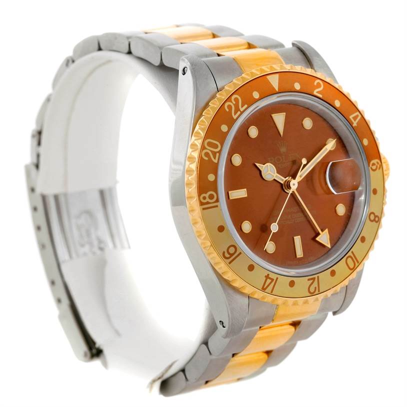 The Rolex GMT-Master 16713 Men's Stainless Steel Brown Dial 16713 Men's Stainless Steel Brown Dial watch is pictured from the front and side, showing its bezel, dial, case, and two-tone bracelet.