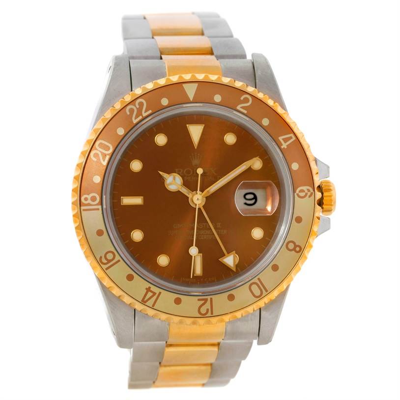 The image shows a frontal view of a Rolex GMT-Master 16713 Men's Stainless Steel Brown Dial 16713 Men's Stainless Steel Brown Dial watch featuring its face, hands, bezel, and bracelet.