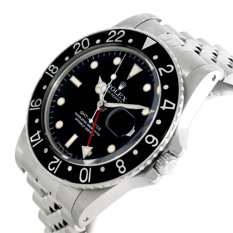 This image shows a close-up angle of the Rolex GMT-Master 16750 Men's Stainless Steel Black Dial 16750 Men's Stainless Steel Black Dial watch, displaying the dial, bezel, crown, and a portion of the bracelet.