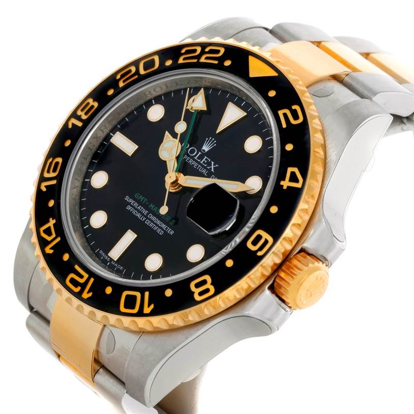 This image shows a side angle of the Rolex GMT-Master 116713 Men's Stainless Steel Black Dial 116713 Men's Stainless Steel Black Dial, highlighting its dial, bezel, and two-tone bracelet.