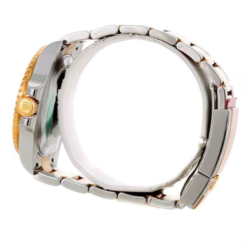 The image shows a side profile of the Rolex GMT-Master 116713 Men's Stainless Steel Black Dial 116713 Men's Stainless Steel Black Dial watch, highlighting its bracelet, clasp, case, and crown.