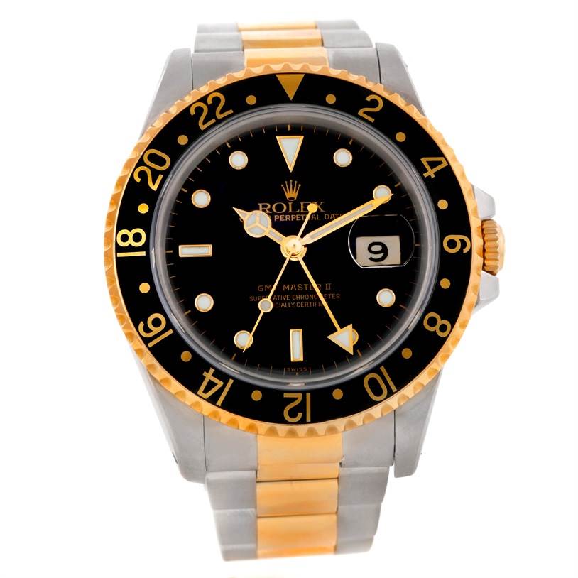 This Rolex GMT-Master 16713 Men
s Stainless Steel Black Dial 16713 Men
s Stainless Steel Black Dial watch is shown from a front angle, displaying its black dial, two-tone bracelet, and 24-hour rotating bezel.