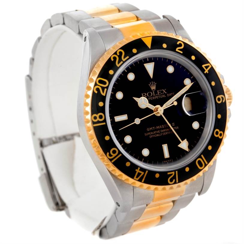 The Rolex GMT-Master 16713 Men
s Stainless Steel Black Dial 16713 Men
s Stainless Steel Black Dial II watch is shown at a slight angle, prominently displaying its face, bezel, and two-tone bracelet.
