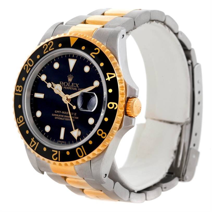 The image shows a Rolex GMT-Master 16713 Men
s Stainless Steel Black Dial 16713 Men
s Stainless Steel Black Dial watch at a three-quarter angle, displaying the bezel, dial, case, and parts of the band.