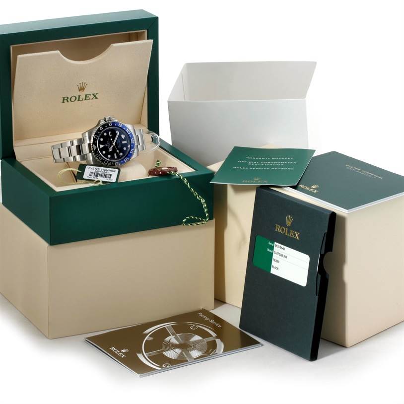 The image shows a Rolex GMT-Master 116710 Men's Stainless Steel Black Dial 116710 Men's Stainless Steel Black Dial watch in its open box with accompanying booklets and packaging.