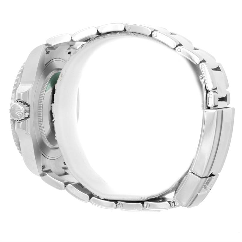 The image shows the side view of a Rolex GMT-Master 116710 Men's Stainless Steel Black Dial 116710 Men's Stainless Steel Black Dial watch, displaying the crown, case, and bracelet links.