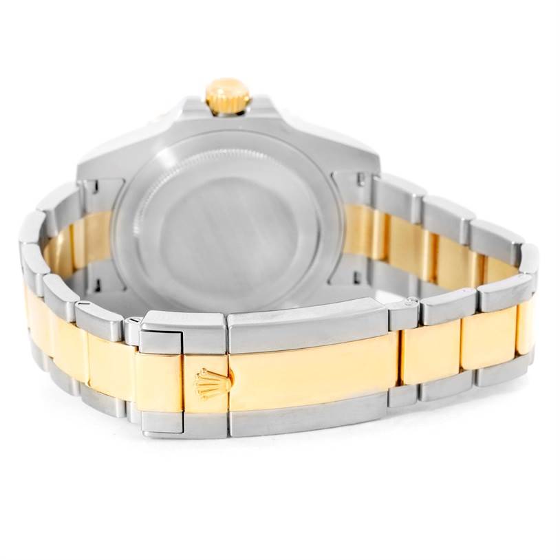 The image shows the back of the case and the two-tone bracelet with clasp of the Rolex GMT-Master 116713 Men's Stainless Steel Black Dial 116713 Men's Stainless Steel Black Dial watch.