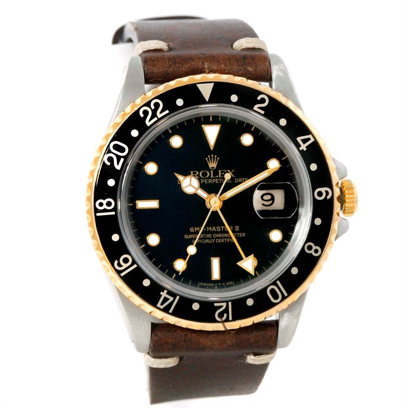 The image shows a Rolex GMT-Master 16713 Men's Stainless Steel Black Dial 16713 Men's Stainless Steel Black Dial II watch from a front angle, displaying its dial, bezel, crystal, hands, and leather strap.