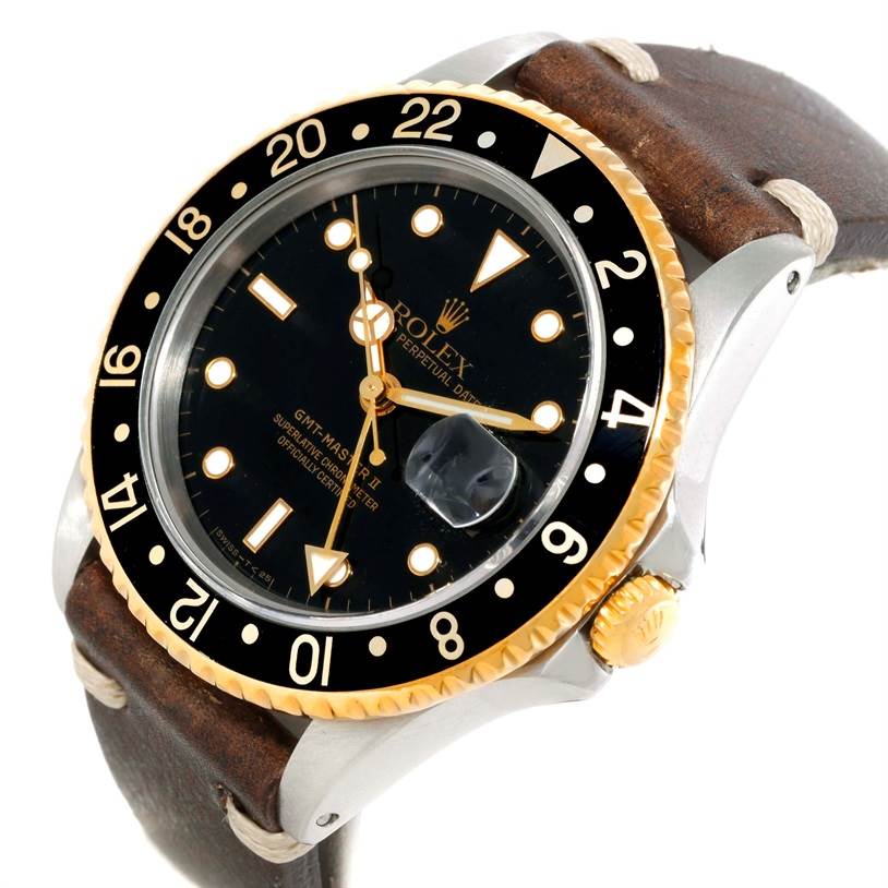 The image shows a Rolex GMT-Master 16713 Men's Stainless Steel Black Dial 16713 Men's Stainless Steel Black Dial watch at a slight angle, highlighting its face, bezel, crown, and leather strap.