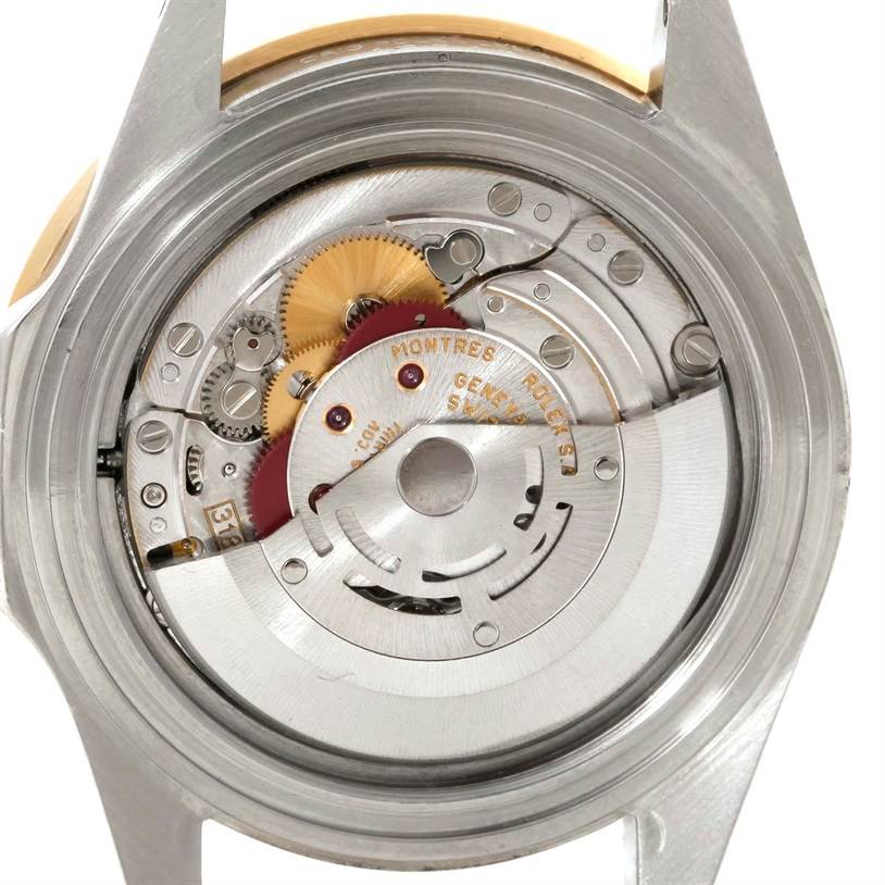 This image shows the inner mechanical movement of a Rolex GMT-Master 16713 Men's Stainless Steel Brown Dial 16713 Men's Stainless Steel Brown Dial watch from the backside.