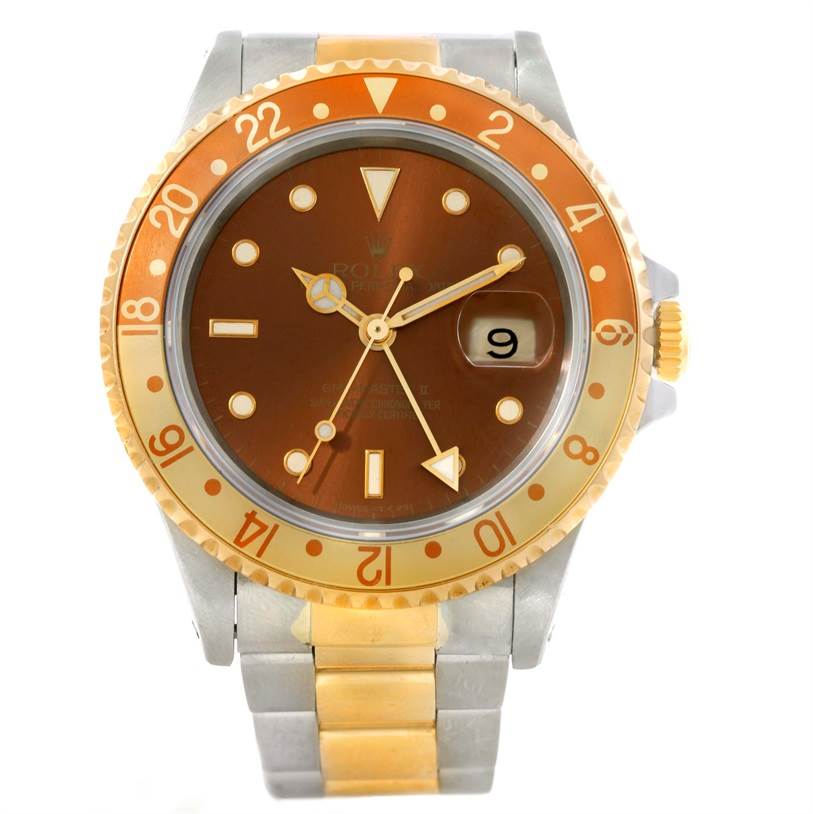 The Rolex GMT-Master 16713 Men's Stainless Steel Brown Dial 16713 Men's Stainless Steel Brown Dial watch is shown head-on, displaying its brown dial, date function, and two-tone metal bracelet.