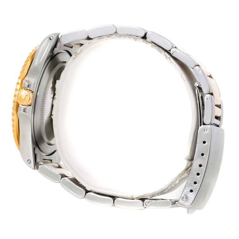 The image shows a side-angle view of a Rolex GMT-Master 16713 Men's Stainless Steel Brown Dial 16713 Men's Stainless Steel Brown Dial watch, highlighting the bracelet, case, crown, and part of the bezel.