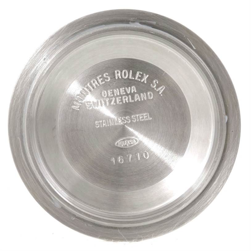 This image shows the underside and branding of the case back of a Rolex GMT-Master 16713 Men's Stainless Steel Brown Dial 16713 Men's Stainless Steel Brown Dial model.