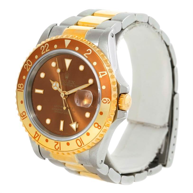 The image shows a Rolex GMT-Master 16713 Men's Stainless Steel Brown Dial 16713 Men's Stainless Steel Brown Dial watch at an angled side view, highlighting the face, bezel, crown, and part of the bracelet.