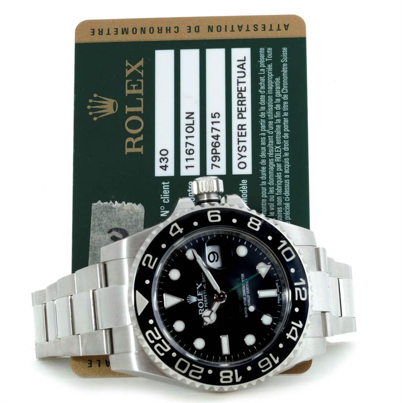 This image shows the front view of a Rolex GMT-Master 116710 Men's Stainless Steel Black Dial 116710 Men's Stainless Steel Black Dial watch with its accompanying authentication card.