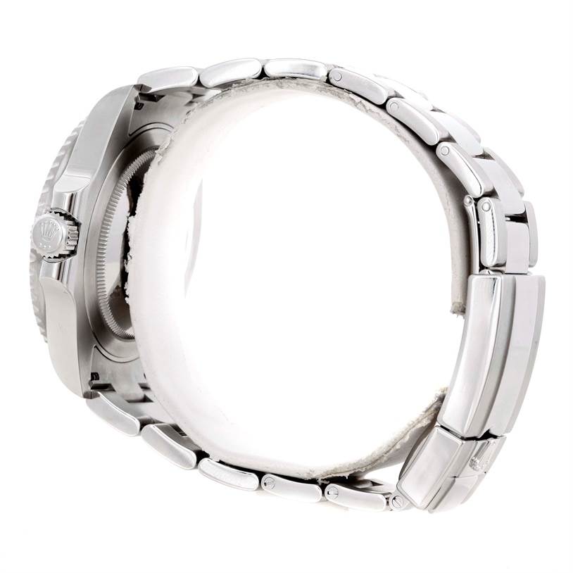 The image shows a side view of a Rolex GMT-Master 116710 Men's Stainless Steel Black Dial 116710 Men's Stainless Steel Black Dial watch, highlighting the case, crown, and metal bracelet.