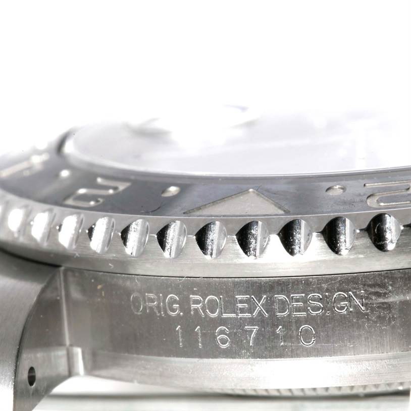 Side view of the Rolex GMT-Master 116710 Men's Stainless Steel Black Dial 116710 Men's Stainless Steel Black Dial showing its bezel and engraved case with the model number 116710C.