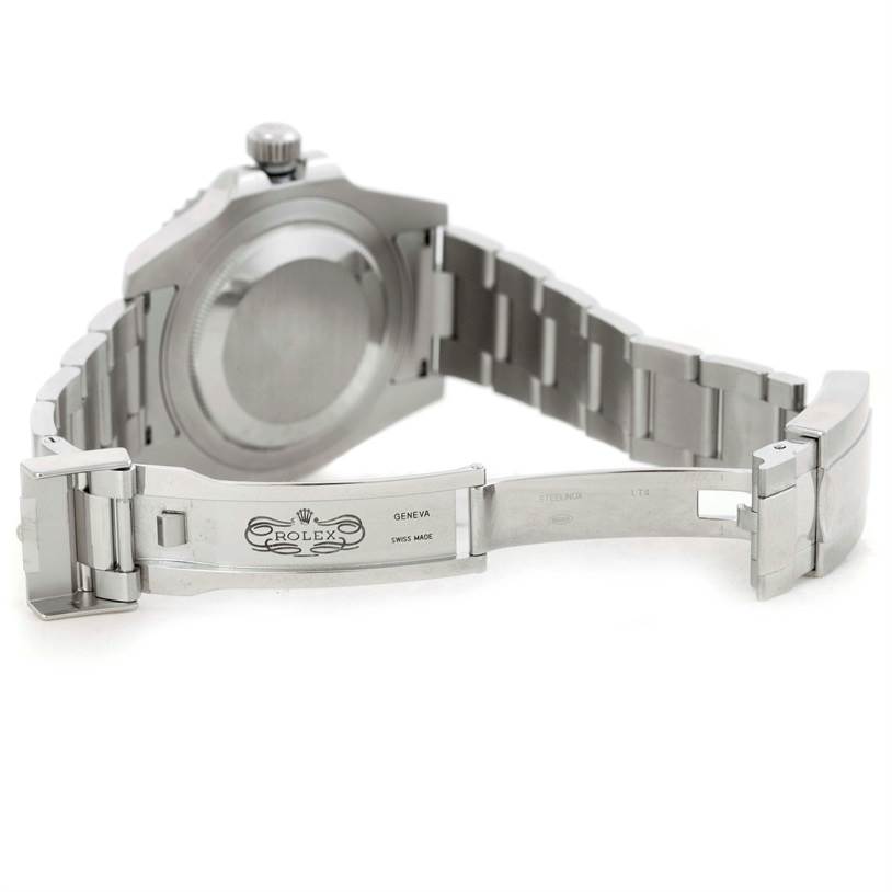 This image shows the backside of a Rolex GMT-Master 116710 Men's Stainless Steel Black Dial 116710 Men's Stainless Steel Black Dial watch with an open clasp and visible bracelet links.