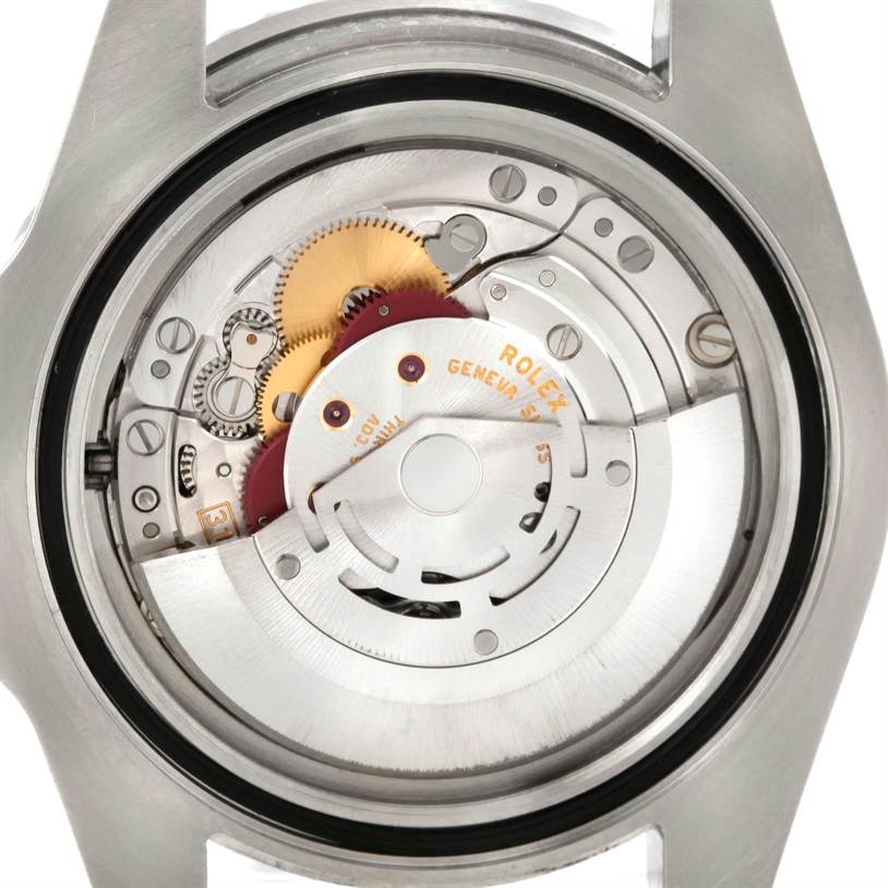 The image shows the internal movement components of a Rolex GMT-Master 116710 Men's Stainless Steel Black Dial 116710 Men's Stainless Steel Black Dial watch from a rear angle with the case back removed.