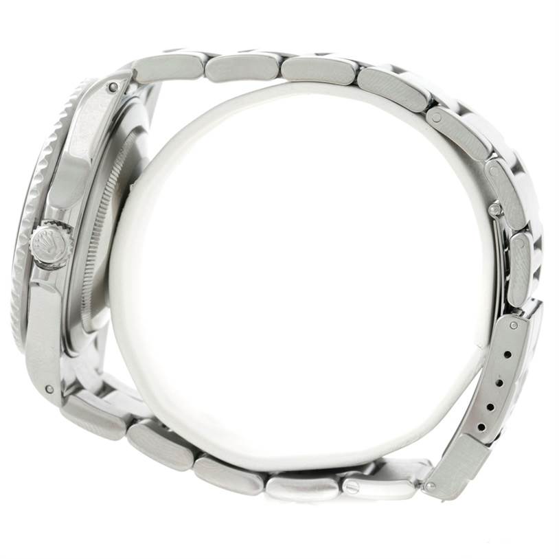 This image shows a side view of the Rolex GMT-Master 16710 Men's Stainless Steel Black Dial 16710 Men's Stainless Steel Black Dial watch, highlighting the crown, case, and bracelet.