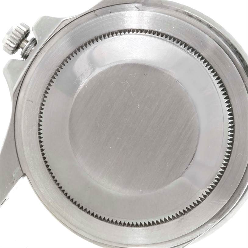 This image shows the case back and part of the crown of a Rolex GMT-Master 1675 Men's Stainless Steel Black Dial 1675 Men's Stainless Steel Black Dial watch from a rear angle.