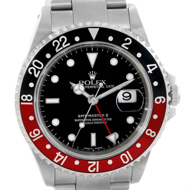 This image shows a front-angle view of a Rolex GMT-Master II watch, featuring a black and red bezel and a stainless steel bracelet.