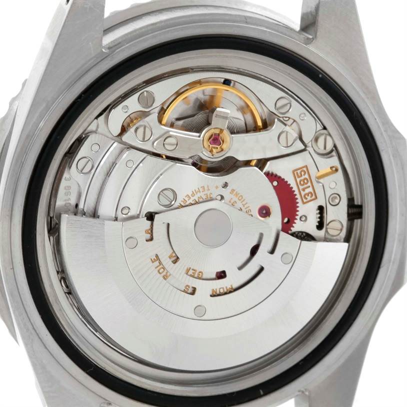 The image shows the internal mechanical movement of a Rolex GMT-Master 16710 Men's Stainless Steel Black Dial 16710 Men's Stainless Steel Black Dial watch from a rear angle.