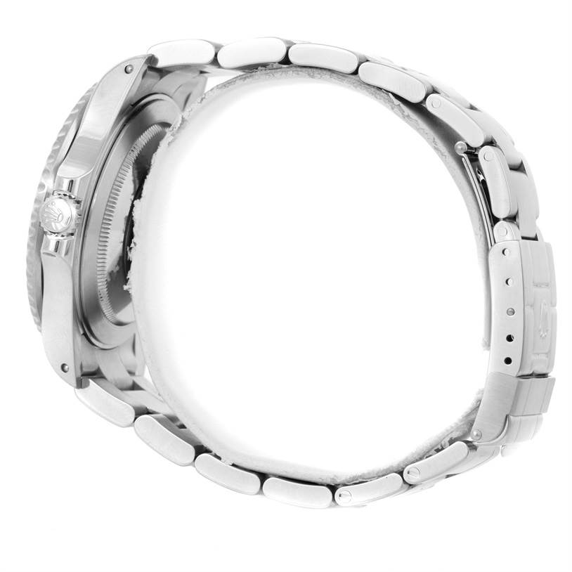 This image shows a side view of the Rolex GMT-Master 16710 Men's Stainless Steel Black Dial 16710 Men's Stainless Steel Black Dial watch, focusing on its case, crown, and bracelet.