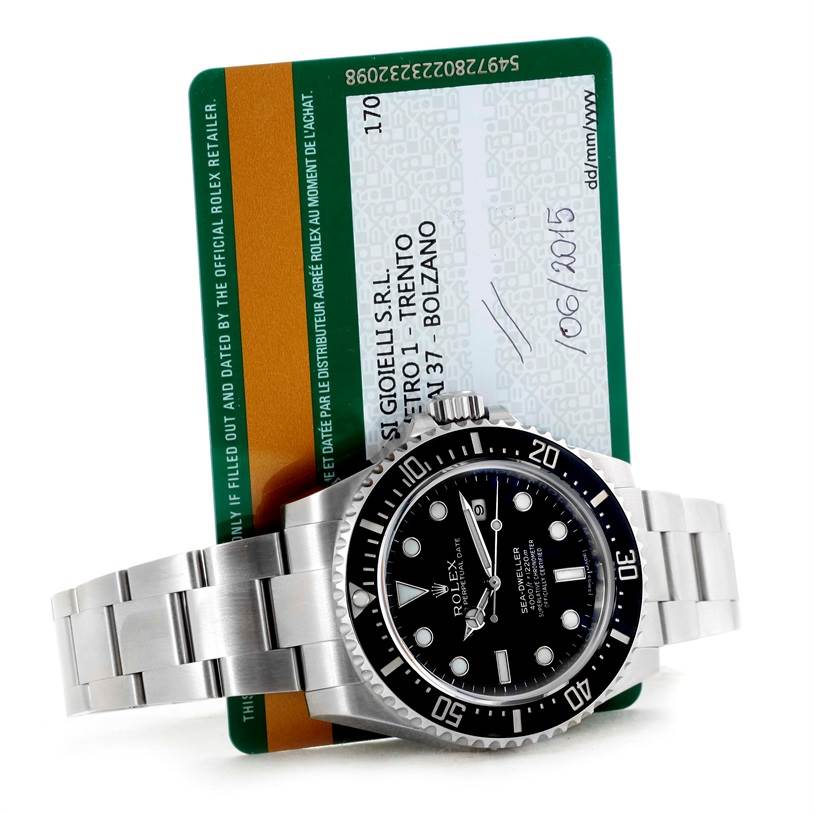 The image shows a Rolex Sea-Dweller 116600 Men's Stainless Steel Black Dial 116600 Men's Stainless Steel Black Dial watch laid flat, displaying the dial, bezel, and bracelet, with an authentication card behind it.