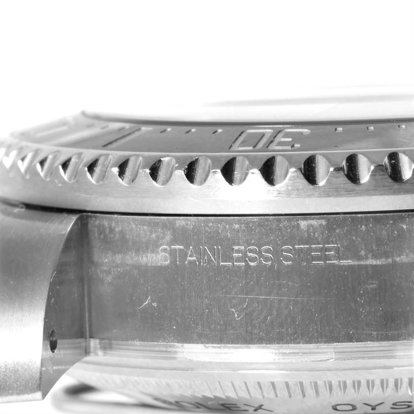 This close-up shows the stainless steel side and bezel of the Rolex Sea-Dweller 116660 Men's Stainless Steel Black Dial 116660 Men's Stainless Steel Black Dial watch.