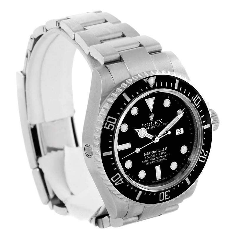 The image shows a Rolex Sea-Dweller 116600 Men
s Stainless Steel Black Dial 116600 Men
s Stainless Steel Black Dial watch at a three-quarter angle highlighting the dial, bezel, and metal bracelet.