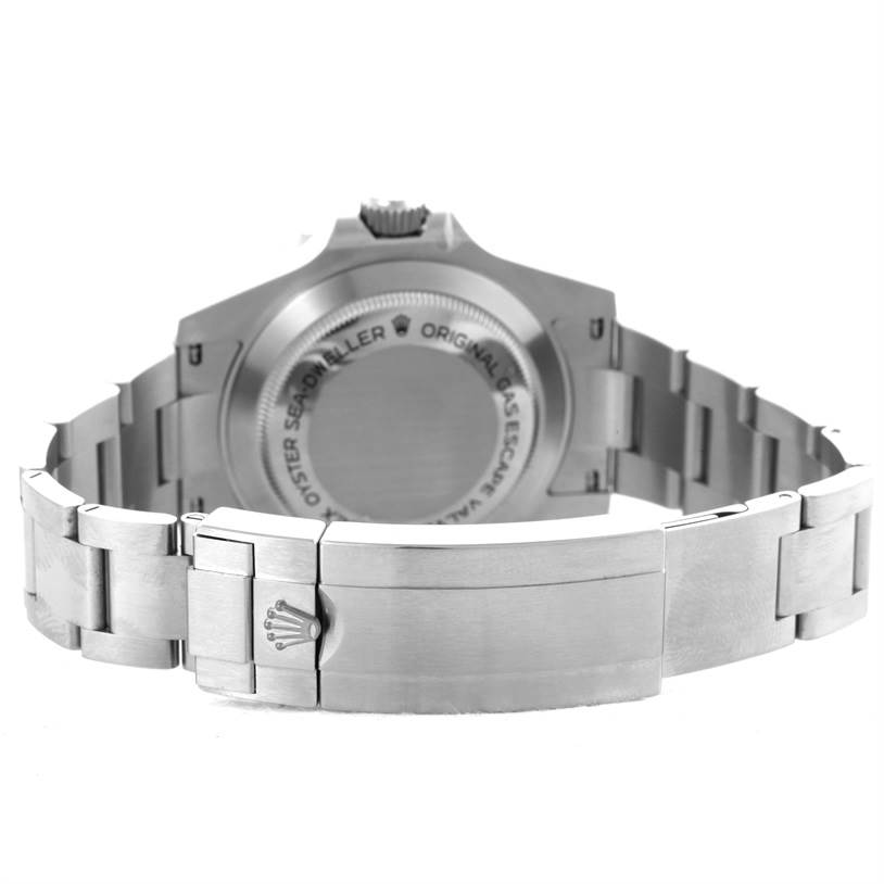 The image shows a rear view of a Rolex Sea-Dweller 116600 Men
s Stainless Steel Black Dial 116600 Men
s Stainless Steel Black Dial watch, focusing on the case back and the metallic bracelet.