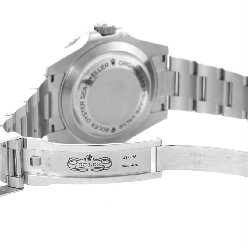 This image shows the backside and opened clasp of a Rolex Sea-Dweller 116600 Men
s Stainless Steel Black Dial 116600 Men
s Stainless Steel Black Dial watch.