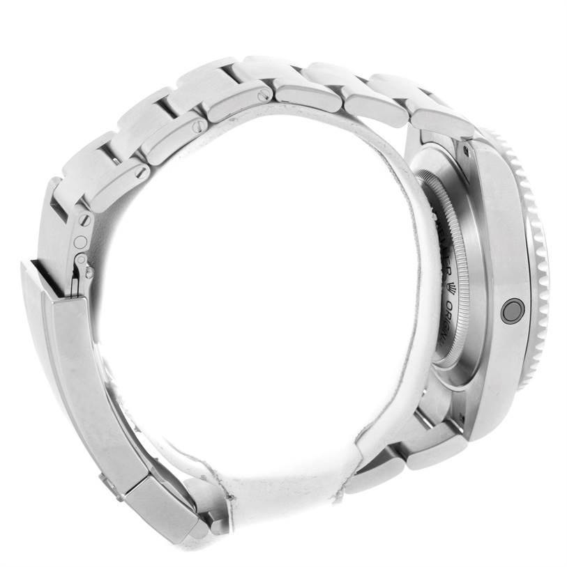 The Rolex Sea-Dweller 116600 Men
s Stainless Steel Black Dial 116600 Men
s Stainless Steel Black Dial watch is shown from a side angle, highlighting its bracelet, clasp, and case back.