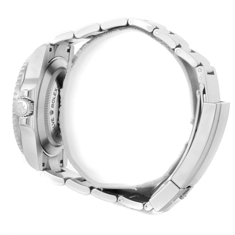 Side view of a Rolex Sea-Dweller 116600 Men
s Stainless Steel Black Dial 116600 Men
s Stainless Steel Black Dial, showing the case back, crown, and metal bracelet.