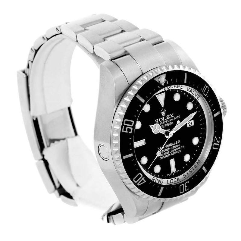 This image shows a Rolex Sea-Dweller watch angled to display its face, bezel, and part of the metal bracelet.