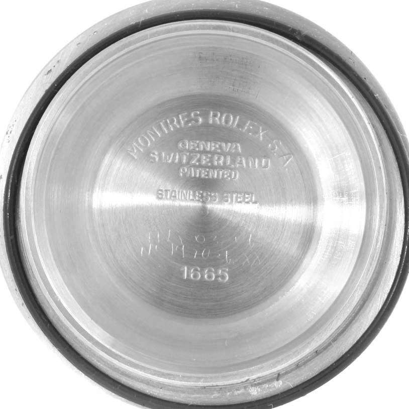 The image shows the inside of the case back of a Rolex Sea-Dweller 1665 Men's Stainless Steel Black Dial 1665 Men's Stainless Steel Black Dial.