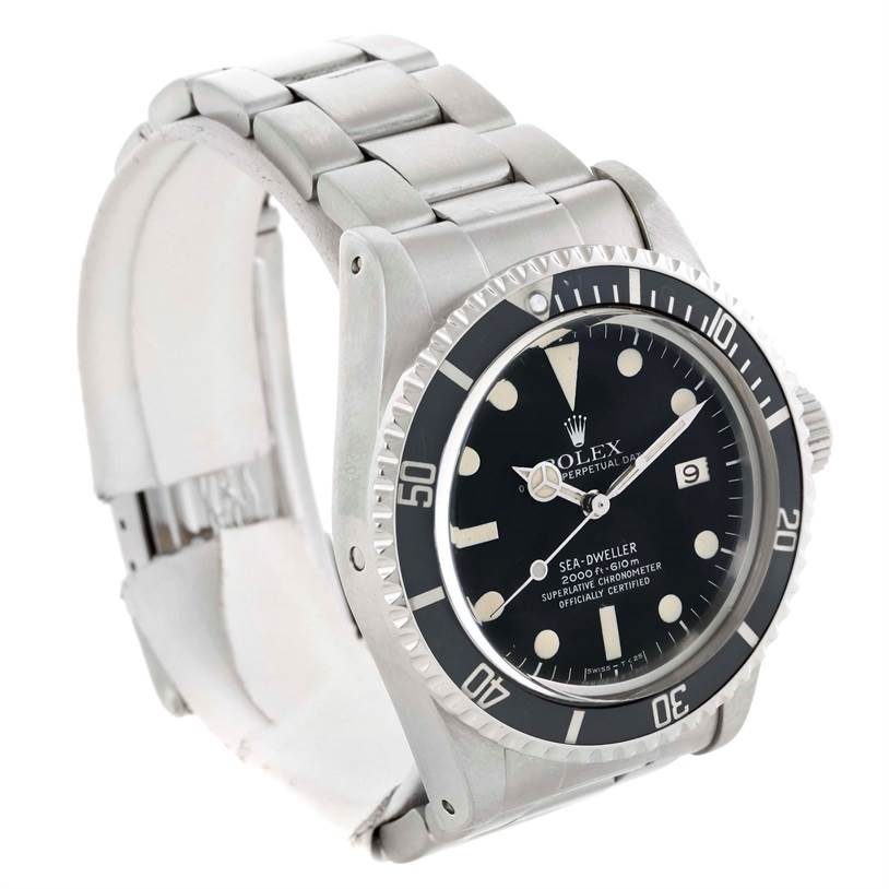The Rolex Sea-Dweller 1665 Men's Stainless Steel Black Dial 1665 Men's Stainless Steel Black Dial watch is shown from a three-quarter angle, displaying its face, bezel, and bracelet.