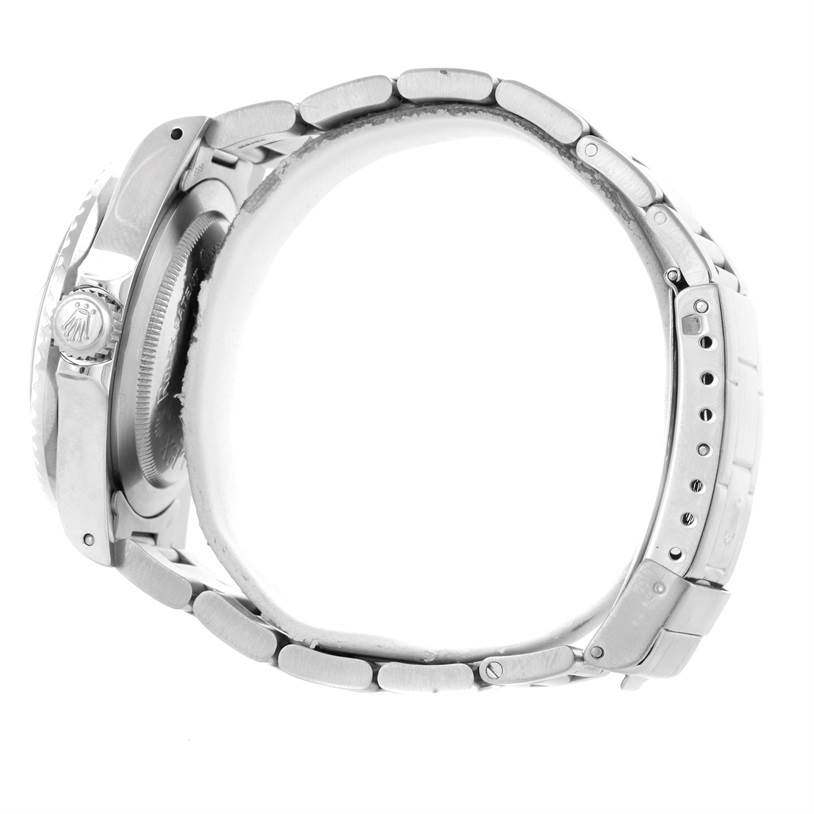 The image shows a side view of the Rolex Sea-Dweller 1665 Men's Stainless Steel Black Dial 1665 Men's Stainless Steel Black Dial model, highlighting the case, crown, and metal bracelet.