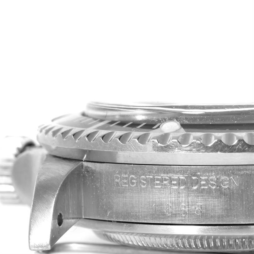 This image shows a close-up side view of the bezel, case, and crown of the Rolex Sea-Dweller 1665 Men's Stainless Steel Black Dial 1665 Men's Stainless Steel Black Dial watch model.