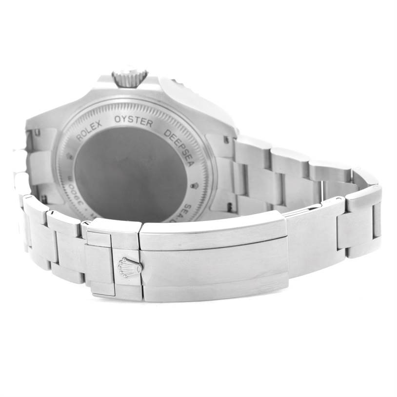 The image shows the back case and bracelet of a Rolex Sea-Dweller 116660 Men
s Stainless Steel Blue Dial 116660 Men
s Stainless Steel Blue Dial watch, highlighting the clasp and engraved case back.