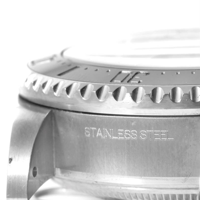 The image shows a close-up of the stainless steel case and bezel of the Rolex Sea-Dweller 116660 Men
s Stainless Steel Blue Dial 116660 Men
s Stainless Steel Blue Dial model.