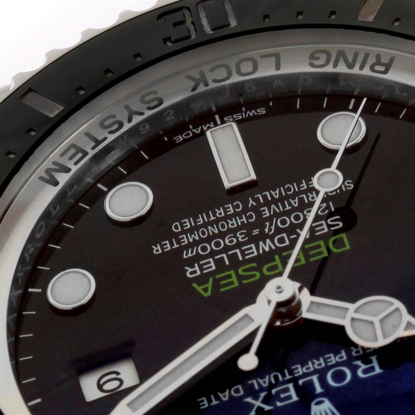 The image shows a close-up of the dial and bezel of a Rolex Sea-Dweller 116660 Men
s Stainless Steel Blue Dial 116660 Men
s Stainless Steel Blue Dial watch, highlighting the "Ring Lock System" text.