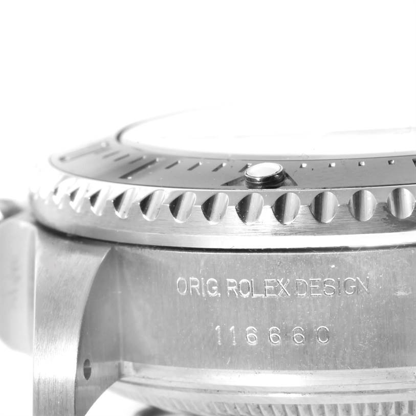 The image shows a close-up of the bezel and side case, including the engraved model number, for a Rolex Sea-Dweller 116660 Men
s Stainless Steel Blue Dial 116660 Men
s Stainless Steel Blue Dial.