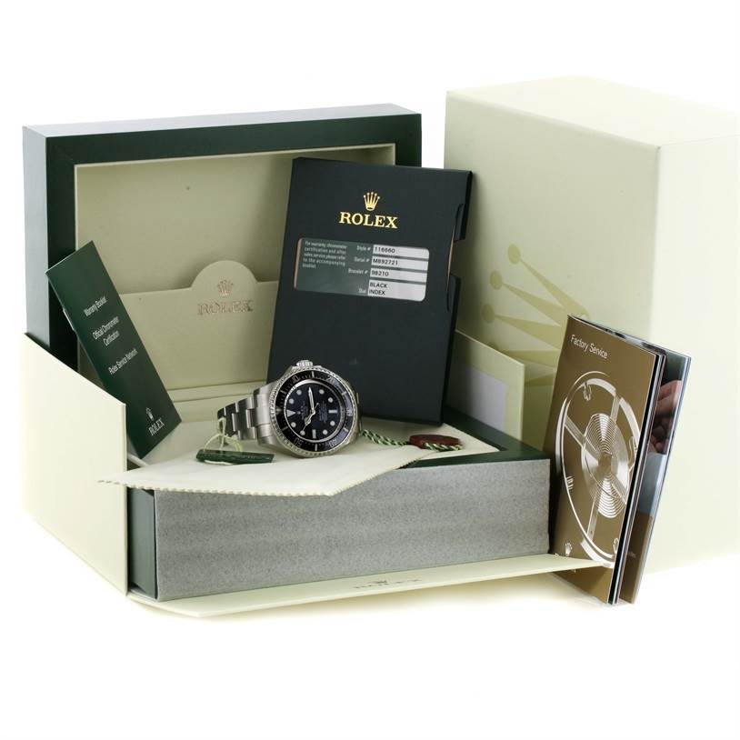 This image shows a Rolex Sea-Dweller 116600 Men's Stainless Steel Black Dial 116600 Men's Stainless Steel Black Dial watch with its original box, warranty card, hang tags, and manuals displayed at an angle.