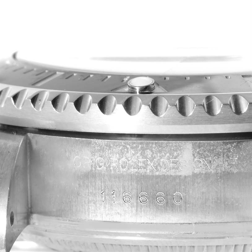 The image shows a close-up side view of the Sea-Dweller model by Rolex, highlighting the bezel and part of the case with its serial number.